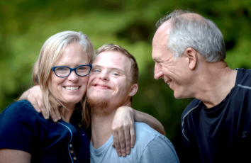 a group of people smiling for the camera